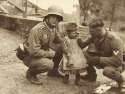 German-soldiers-comfort-crying-child.jpg