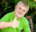 boy-with-downs-syndrome-giving-thumbs-up.jpg