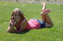 5397308-Young-Girl-Laying-on-Green-Lawn-Stock-Photo-feet.jpg