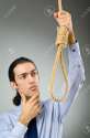 10819091-Businessman-with-thoughts-of-suicide-Stock-Photo-noose-depression.jpg