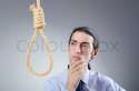3093420-businessman-committing-suicide-through-hanging.jpg