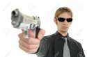 6894215-Young-man-holding-up-a-gun-with-the-focus-on-his-face-He-is-wearing-sunglasses-and-is-isolated-on-wh-Stock-Photo.jpg