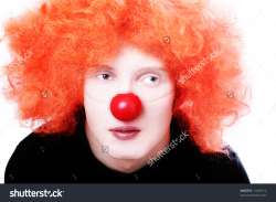 stock-photo-portrait-of-redhead-clown-looking-upwards-thoughtfully-11648710.jpg