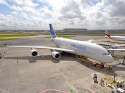 A380_at_hub_from_side_London_Heathrow_Airport.jpg.jpg