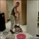 2 military men - one cleaning implament.gif