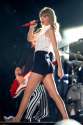 tmp_5272-Taylor_Swift_is_joined_on_stage_by_Tim_McGraw_and_Keith_Urban_for_the_first_night_of_the_CMA_festival-2089369917.jpg