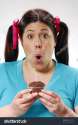 stock-photo-fat-girl-holding-a-chocolate-snack-cake-happy-girl-holding-a-chocolate-snack-cake-woman-eating-38592739.jpg