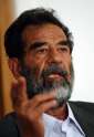 800px-Saddam_Hussein_at_trial,_July_2004-edit1.jpg