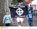 man-displaying-white-pride-world-wide-flag-24710288.jpg