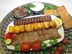 Iranian_Food_Taste_of_Persia_Kabab-e_Barg_Lamb_Koobideh_Joojeh_Chicken_Salad_Shirazi.jpg