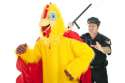 208911_stock-photo-cop-chasing-chicken-man.jpg
