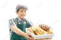25445316-Asian-man-baking-bread-Stock-Photo.jpg