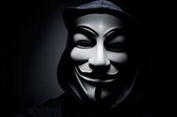 stock-photo-paris-france-january-man-wearing-vendetta-mask-this-mask-is-a-well-known-symbol-for-244924321.jpg