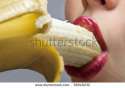 stock-photo-close-up-female-mouth-eating-peeled-banana-56040232.jpg