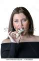 stock-photo-cute-brunette-lady-wear-black-shirt-holding-and-eating-a-peeled-banana-379738522.jpg