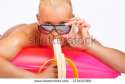 stock-photo-sexy-blond-girl-in-sunglasses-and-banana-posing-on-pink-water-mattress-273452369.jpg