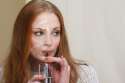 A picture of how Sophie Turner might look with cum all over her face, while enjoying a refreshing glass of water..jpg