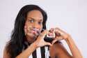 47715562-black-woman-making-a-heart-with-her-hands.jpg