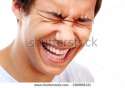 stock-photo-close-up-portrait-of-young-man-laughing-out-loud-290808131.jpg