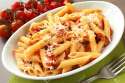 16158336-Italian-pasta-in-a-white-oval-plate-Stock-Photo-pasta-penne-sauce.jpg