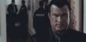 Steven-Seagal-With-An-Intense-Angry-Look-During-a-Dramatic-Close-Up.gif