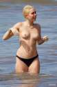 miley cyrus topless at the beach.jpg