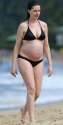 pregnant-anne-hathaway-in-bikini-at-a-beach-in-hawaii-01-03-2016_32.jpg
