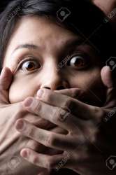 4787785-A-young-woman-is-being-kidnapped-or-silenced-Stock-Photo-kidnapping.jpg