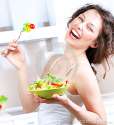 diet-woman-eating-vegetable-salad-26750865.jpg