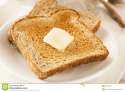 whole-wheat-buttered-toast-breakfast-time-32916423.jpg