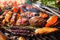 getty_rm_photo_of_assorted_meats_cooking_on_grill.jpg