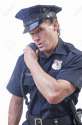 27714055-Male-Caucasian-police-officer-in-blue-cop-uniform-talks-on-his-radio-receiver-on-white-background-Stock-Photo.jpg