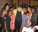 George Martin with black girls.jpg