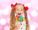 10913285-Life-is-great-extremely-happy-little-girl-with-lollipop-Stock-Photo.jpg