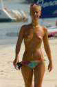 Topless_woman_Coral_Beach,_Jamaica.jpg