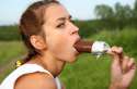 Young-sexy-girl-licking-ice-cream-outdoors-8.jpg
