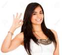 9043143-Woman-making-an-ok-sign-with-her-hand-isolated-Stock-Photo-happy.jpg