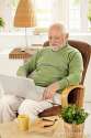 older-man-using-laptop-computer-home-16618130.jpg