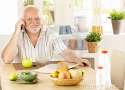 healthy-pensioner-using-cellphone-breakfast-16618225.jpg