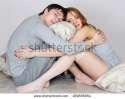 stock-photo-young-beautiful-happy-couple-embraces-in-a-bed-109806854.jpg