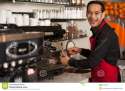 happy-barista-staff-preparing-order-cheerful-male-customers-32848571.jpg