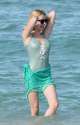 emma-roberts-in-a-swimsuit-on-the-beach-in-miami-july-2016-4.jpg