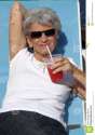 elderly-woman-relaxing-9011511.jpg