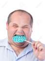 15211164-Fat-Man-in-a-Blue-Shirt-Eating-a-Lollipop-isolated-Stock-Photo.jpg