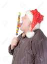 15869782-Cheerful-obese-man-in-a-red-Santa-hat-chewing-on-a-long-colourful-spiral-lollipop-with-a-grin-on-his-Stock-Photo.jpg