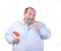 15210858-Fat-Man-in-a-Blue-Shirt-Eating-a-Lollipop-isolated-Stock-Photo.jpg