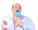 15210995-Fat-Man-in-a-Blue-Shirt-Eating-a-Lollipop-isolated-Stock-Photo.jpg