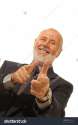 stock-photo-older-businessman-playing-around-and-giving-props-with-finger-guns-focus-on-hands-isolated-on-6298138.jpg
