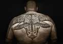 attractive-bull-tattoo-on-upperback-for-men.jpg