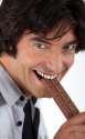 Why the fuck is this guy so happy about eating a choco-cock.jpg